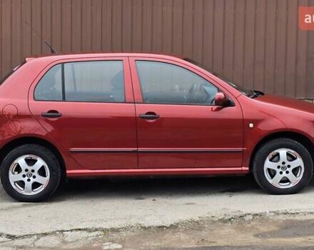 Червоний Шкода Фабія, об'ємом двигуна 1.39 л та пробігом 130 тис. км за 5999 $, фото 16 на Automoto.ua