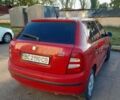 Красный Шкода Фабия, объемом двигателя 1.2 л и пробегом 260 тыс. км за 3500 $, фото 1 на Automoto.ua