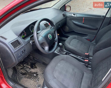 Червоний Шкода Фабія, об'ємом двигуна 1.39 л та пробігом 180 тис. км за 2350 $, фото 7 на Automoto.ua