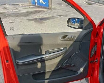 Красный Шкода Фабия, объемом двигателя 1.2 л и пробегом 184 тыс. км за 3000 $, фото 4 на Automoto.ua