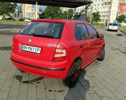 Красный Шкода Фабия, объемом двигателя 1.2 л и пробегом 184 тыс. км за 3000 $, фото 2 на Automoto.ua