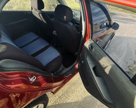 Красный Шкода Фабия, объемом двигателя 1.2 л и пробегом 229 тыс. км за 3300 $, фото 2 на Automoto.ua