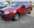Красный Шкода Фабия, объемом двигателя 1.2 л и пробегом 150 тыс. км за 3700 $, фото 1 на Automoto.ua