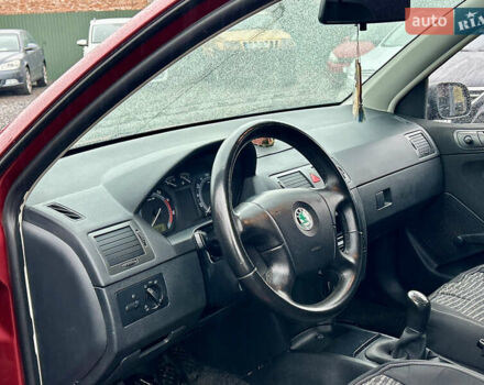 Красный Шкода Фабия, объемом двигателя 1.2 л и пробегом 189 тыс. км за 3599 $, фото 7 на Automoto.ua