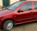 Красный Шкода Фабия, объемом двигателя 1.2 л и пробегом 110 тыс. км за 3100 $, фото 1 на Automoto.ua