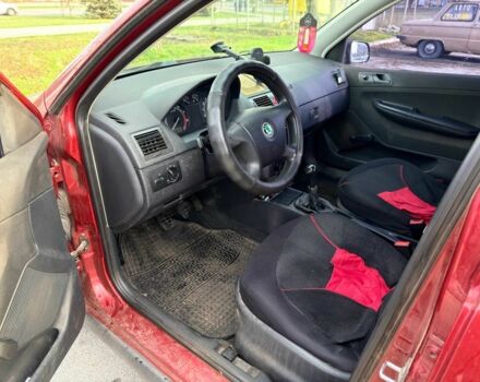 Красный Шкода Фабия, объемом двигателя 1.2 л и пробегом 283 тыс. км за 3700 $, фото 9 на Automoto.ua