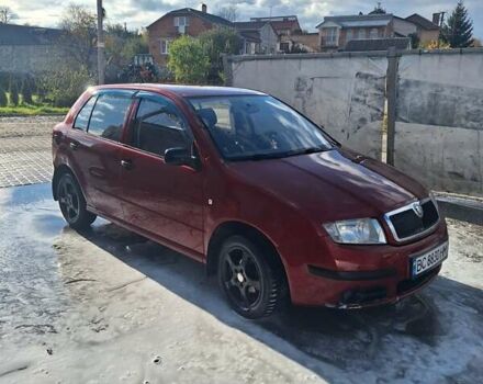 Красный Шкода Фабия, объемом двигателя 1.2 л и пробегом 260 тыс. км за 2700 $, фото 4 на Automoto.ua