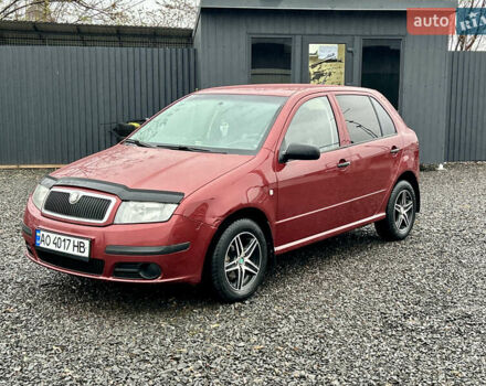 Красный Шкода Фабия, объемом двигателя 1.2 л и пробегом 189 тыс. км за 3599 $, фото 1 на Automoto.ua