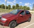 Красный Шкода Фабия, объемом двигателя 1.2 л и пробегом 202 тыс. км за 3600 $, фото 1 на Automoto.ua
