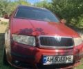 Красный Шкода Фабия, объемом двигателя 1.2 л и пробегом 124 тыс. км за 4200 $, фото 1 на Automoto.ua