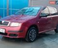 Красный Шкода Фабия, объемом двигателя 1.2 л и пробегом 179 тыс. км за 2950 $, фото 1 на Automoto.ua
