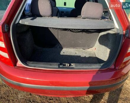 Красный Шкода Фабия, объемом двигателя 1.2 л и пробегом 110 тыс. км за 3100 $, фото 6 на Automoto.ua