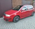 Красный Шкода Фабия, объемом двигателя 1.4 л и пробегом 190 тыс. км за 4272 $, фото 1 на Automoto.ua