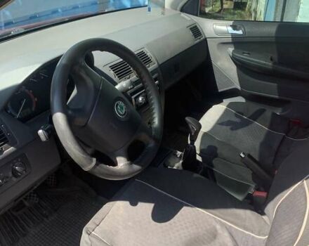 Красный Шкода Фабия, объемом двигателя 1.2 л и пробегом 124 тыс. км за 4200 $, фото 10 на Automoto.ua