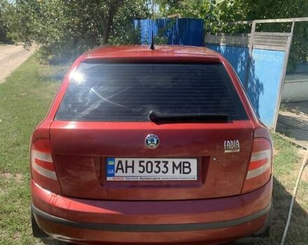 Красный Шкода Фабия, объемом двигателя 1.2 л и пробегом 124 тыс. км за 4200 $, фото 2 на Automoto.ua