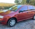Красный Шкода Фабия, объемом двигателя 1.2 л и пробегом 253 тыс. км за 3500 $, фото 1 на Automoto.ua