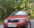 Красный Шкода Фабия, объемом двигателя 1.2 л и пробегом 374 тыс. км за 2750 $, фото 1 на Automoto.ua