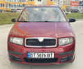 Красный Шкода Фабия, объемом двигателя 1.2 л и пробегом 155 тыс. км за 3499 $, фото 2 на Automoto.ua