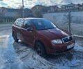 Красный Шкода Фабия, объемом двигателя 1.2 л и пробегом 260 тыс. км за 2700 $, фото 1 на Automoto.ua
