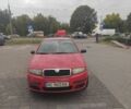 Красный Шкода Фабия, объемом двигателя 1.2 л и пробегом 260 тыс. км за 2800 $, фото 1 на Automoto.ua