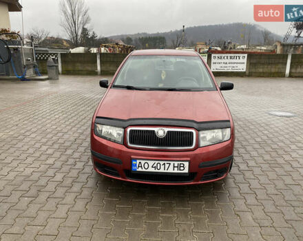 Красный Шкода Фабия, объемом двигателя 1.2 л и пробегом 189 тыс. км за 2999 $, фото 1 на Automoto.ua