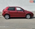 Красный Шкода Фабия, объемом двигателя 1.2 л и пробегом 156 тыс. км за 3900 $, фото 4 на Automoto.ua