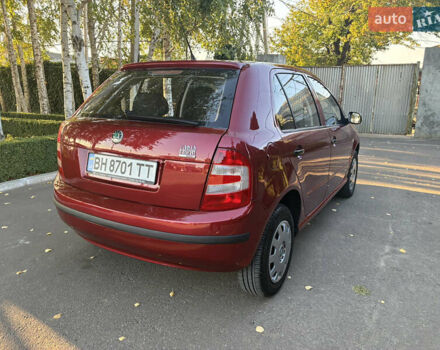 Красный Шкода Фабия, объемом двигателя 1.2 л и пробегом 150 тыс. км за 3950 $, фото 3 на Automoto.ua