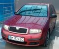 Красный Шкода Фабия, объемом двигателя 1.2 л и пробегом 180 тыс. км за 2950 $, фото 3 на Automoto.ua
