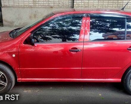 Красный Шкода Фабия, объемом двигателя 1.2 л и пробегом 255 тыс. км за 3400 $, фото 3 на Automoto.ua