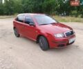 Червоний Шкода Фабія, об'ємом двигуна 1.2 л та пробігом 201 тис. км за 3300 $, фото 1 на Automoto.ua