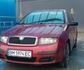 Красный Шкода Фабия, объемом двигателя 1.2 л и пробегом 180 тыс. км за 2950 $, фото 1 на Automoto.ua
