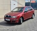 Красный Шкода Фабия, объемом двигателя 1.2 л и пробегом 156 тыс. км за 3900 $, фото 1 на Automoto.ua