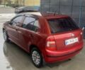 Красный Шкода Фабия, объемом двигателя 1.2 л и пробегом 221 тыс. км за 3950 $, фото 4 на Automoto.ua
