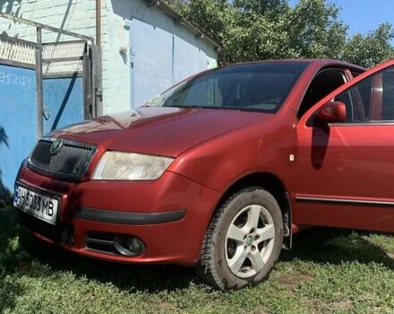 Красный Шкода Фабия, объемом двигателя 1.2 л и пробегом 124 тыс. км за 4200 $, фото 5 на Automoto.ua
