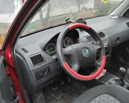 Красный Шкода Фабия, объемом двигателя 1.2 л и пробегом 156 тыс. км за 4050 $, фото 3 на Automoto.ua