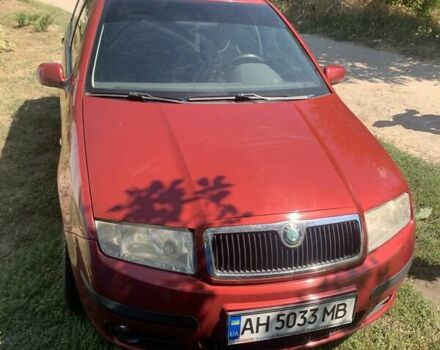 Красный Шкода Фабия, объемом двигателя 1.2 л и пробегом 124 тыс. км за 4200 $, фото 1 на Automoto.ua