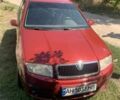 Красный Шкода Фабия, объемом двигателя 1.2 л и пробегом 124 тыс. км за 4200 $, фото 1 на Automoto.ua