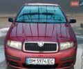 Красный Шкода Фабия, объемом двигателя 1.2 л и пробегом 179 тыс. км за 2950 $, фото 11 на Automoto.ua