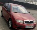 Красный Шкода Фабия, объемом двигателя 1.2 л и пробегом 221 тыс. км за 3950 $, фото 1 на Automoto.ua