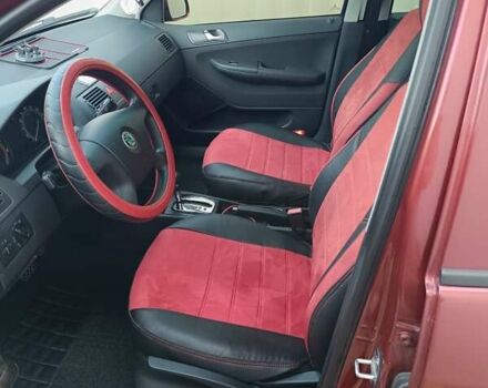 Красный Шкода Фабия, объемом двигателя 1.4 л и пробегом 226 тыс. км за 5200 $, фото 3 на Automoto.ua