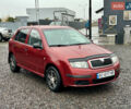 Красный Шкода Фабия, объемом двигателя 1.2 л и пробегом 189 тыс. км за 3599 $, фото 2 на Automoto.ua