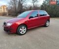 Красный Шкода Фабия, объемом двигателя 1.39 л и пробегом 300 тыс. км за 3900 $, фото 1 на Automoto.ua