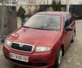 Красный Шкода Фабия, объемом двигателя 1.2 л и пробегом 221 тыс. км за 3950 $, фото 1 на Automoto.ua