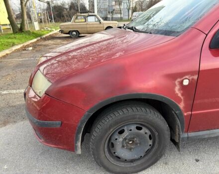 Красный Шкода Фабия, объемом двигателя 1.2 л и пробегом 283 тыс. км за 3700 $, фото 5 на Automoto.ua