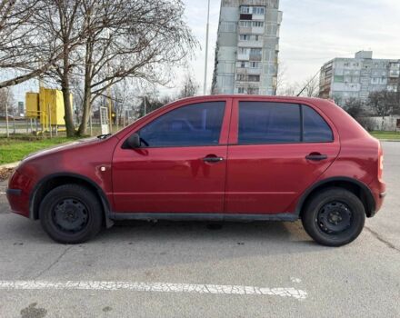 Красный Шкода Фабия, объемом двигателя 1.2 л и пробегом 283 тыс. км за 3700 $, фото 2 на Automoto.ua