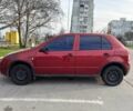 Красный Шкода Фабия, объемом двигателя 1.2 л и пробегом 283 тыс. км за 3700 $, фото 2 на Automoto.ua