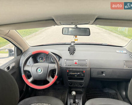 Красный Шкода Фабия, объемом двигателя 1.2 л и пробегом 155 тыс. км за 3499 $, фото 10 на Automoto.ua