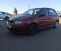 Красный Шкода Фабия, объемом двигателя 1.2 л и пробегом 160 тыс. км за 4000 $, фото 1 на Automoto.ua