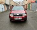 Красный Шкода Фабия, объемом двигателя 1.4 л и пробегом 221 тыс. км за 4500 $, фото 1 на Automoto.ua