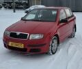 Красный Шкода Фабия, объемом двигателя 1.2 л и пробегом 326 тыс. км за 3300 $, фото 1 на Automoto.ua
